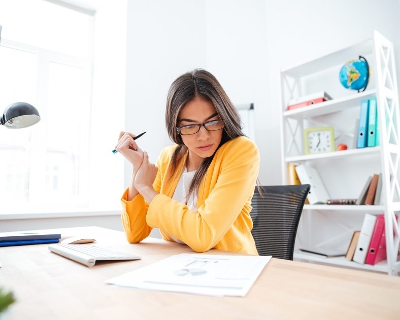 businesswoman-analysing-document-P8WSNMC-788x631